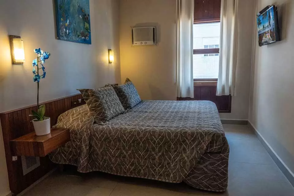 strand-hotel-guaruja-suite-conforto-sem-varanda.jpg